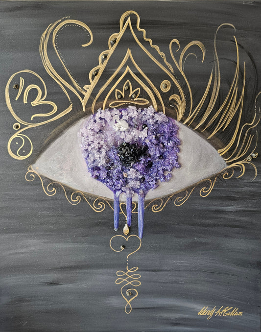 The Soul’s Eye Resin Artwork shown on this image, the background is acrylic paint, with gold detail, with amethyst quartz and black tourmaline crystals.