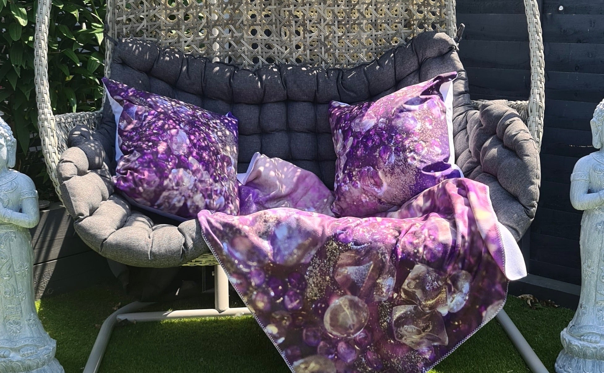 Garden Cushions on a swinging wicker chair.