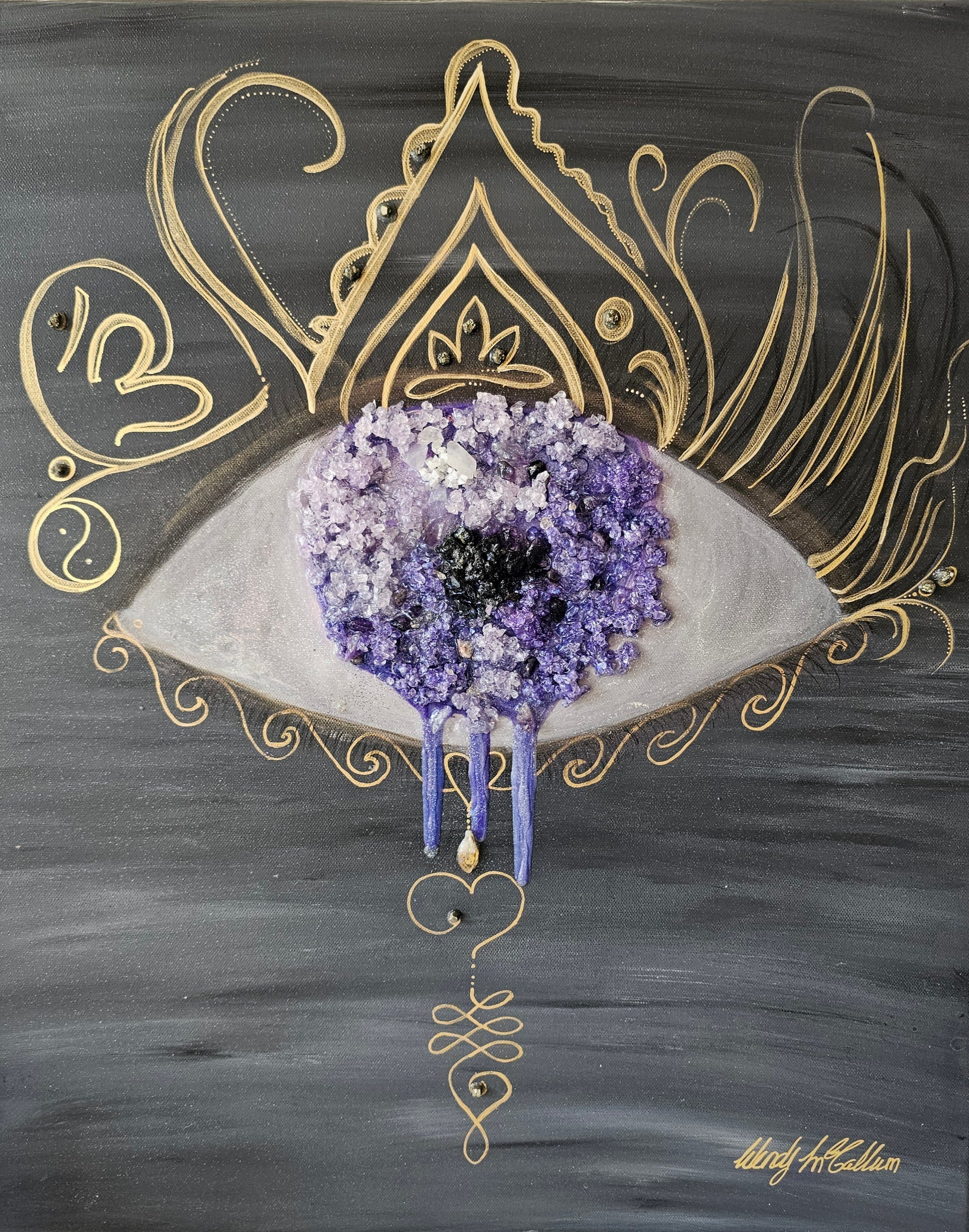 The Soul’s Eye Resin Artwork  shown on this image, the background is acrylic paint, with gold detail, with amethyst quartz and black tourmaline crystals.